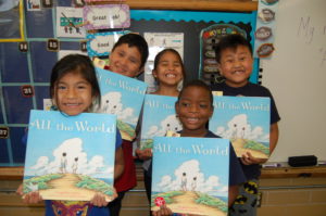 Young readers with Liz Garton Scanlon's Caldecott Honor picture book ALL THE WORLD
