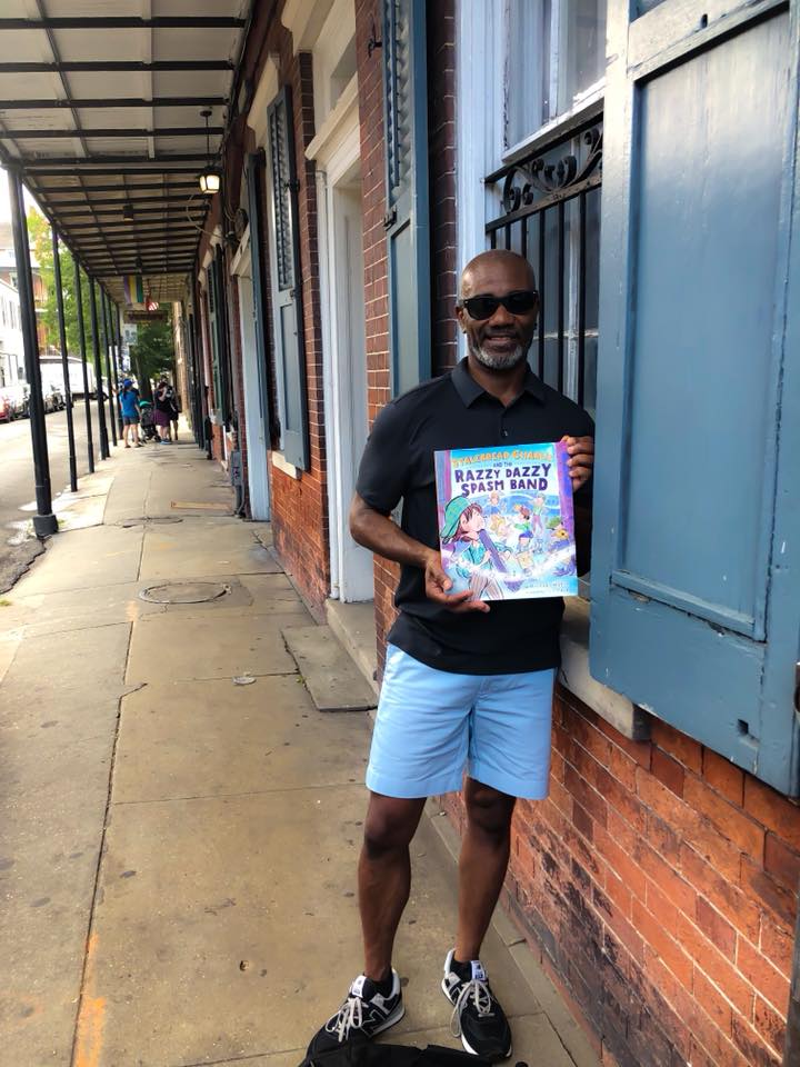 Author/illustrator Don Tate with his book Stalebread Charlie and the Razzy Dazzy Spasm Band