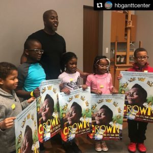 Illustrator Gordon C. James with young fans of Crown: Ode to a Fresh Cut