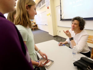 April Henry connects with students.