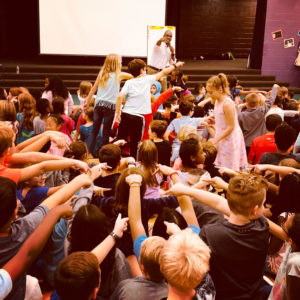Excited students at a school visit with Don Tate.