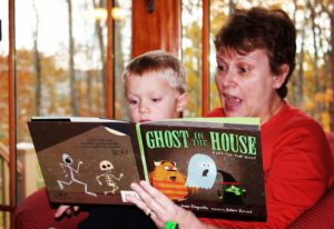 Readers enjoying Ammi-Joan Paquette's GHOST IN THE HOUSE.